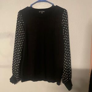 Chic Black Sweater with Polka Dot Sleeves